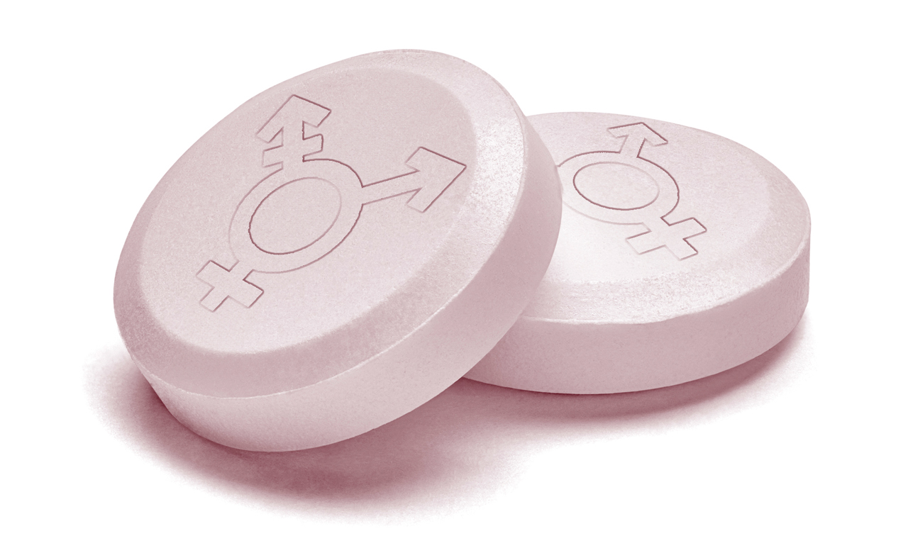Medicine tablets with multi-gender symbols stamped into them.