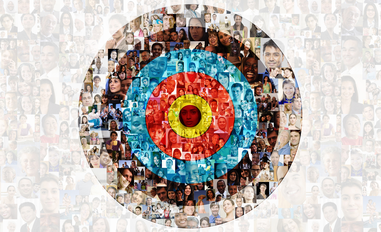 Target with a medley of human faces collaged within it.