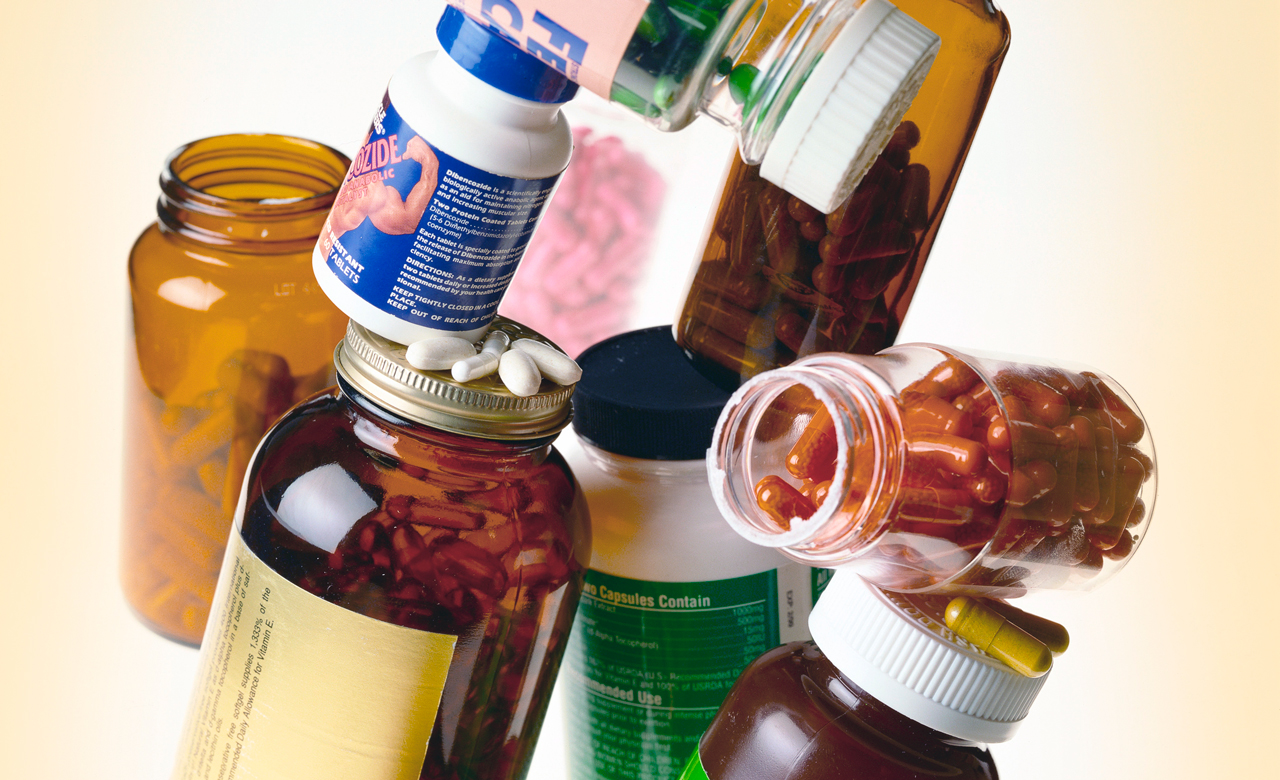 Image of various dietary supplements in bottles.