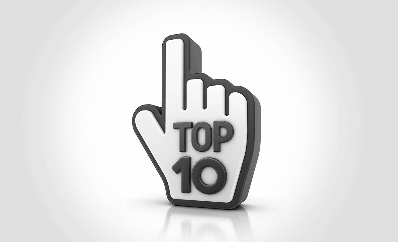 "Top 10" text within graphic of hand with index finger extended.